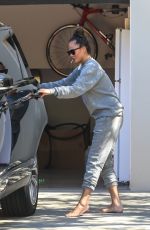 CHRISSY TEIGEN Outside Her Home in Malibu 04/16/2020