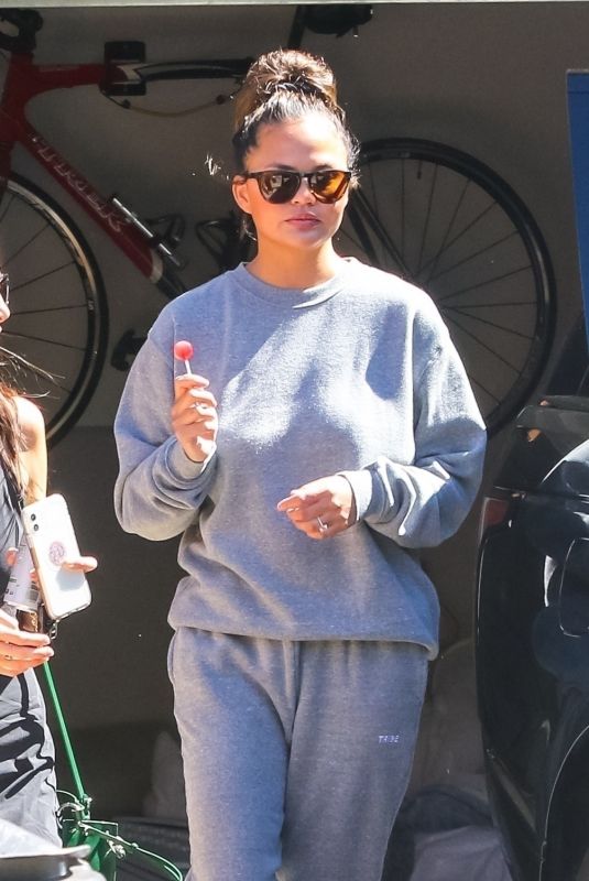 CHRISSY TEIGEN Outside Her Home in Malibu 04/16/2020