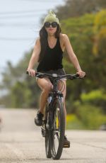 DAKOTA JOHNSON Out Riding Bike in Malibu 04/18/2020