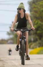 DAKOTA JOHNSON Out Riding Bike in Malibu 04/18/2020