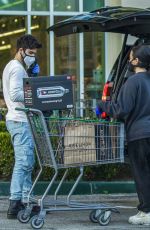 DEMI LOVATO and Max Ehrich Wearing Masks Shopping at Erewhon Organic Store in Los Angeles 04/04/2020