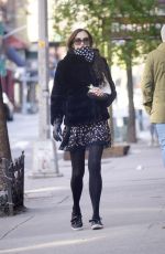 FAMKE JANSSEN Wearing Scarf and Gloves Out in New York 04/11/2020