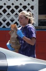 FLORENCE PUGH Wears Gloves Out Sopping in Los Angeles 04/03/2020
