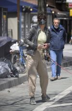 HELENA CHRISTENSEN Wearing Mask Out with Her Dog in New York 04/23/2020