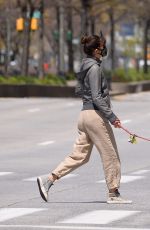 HELENA CHRISTENSEN Wearing Mask Out with Her Dog in New York 04/23/2020