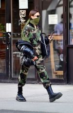 IRINA SHAYK in Camouflage Moschino Jumpsuit and Army Green Scarf Out in New York 04/14/2020