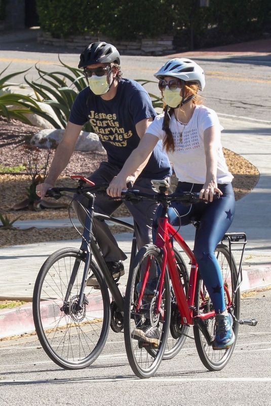 ISLA FISHER and Sacha Baron Cohen Out Riding Bikes in Los Angeles 04/24/2020
