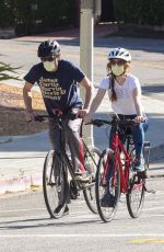 ISLA FISHER and Sacha Baron Cohen Out Riding Bikes in Los Angeles 04/24/2020