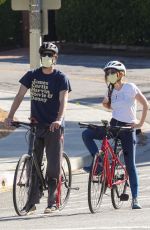 ISLA FISHER and Sacha Baron Cohen Out Riding Bikes in Los Angeles 04/24/2020