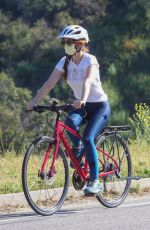 ISLA FISHER and Sacha Baron Cohen Out Riding Bikes in Los Angeles 04/24/2020