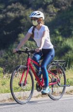 ISLA FISHER and Sacha Baron Cohen Out Riding Bikes in Los Angeles 04/24/2020
