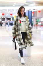 JANINE CHAG at Airport in Shanghai 04/13/2020