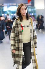 JANINE CHAG at Airport in Shanghai 04/13/2020