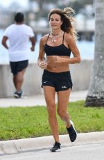 KELLY BENSIMON in Shorts Out Jogging in Palm Beach 04/07/2020