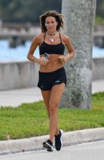 KELLY BENSIMON in Shorts Out Jogging in Palm Beach 04/07/2020