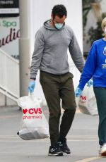 KRISTEN WIIG and Avi Rothman Wearing Masks and Rubber Gloves Out Shopping in Los Angeles 04/14/2020
