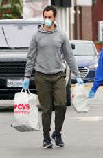 KRISTEN WIIG and Avi Rothman Wearing Masks and Rubber Gloves Out Shopping in Los Angeles 04/14/2020