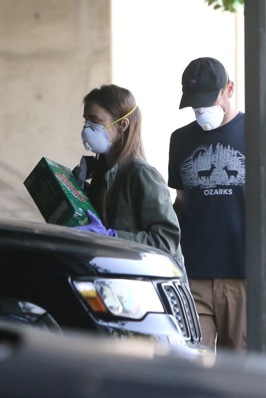 LILY COLLINS and Charlie McDowell Out Shopping in Los Angeles 04/03/2020