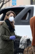 LILY COLLINS Leaves a Grocery Store in Los Angeles 04/09/2020