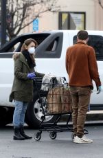 LILY COLLINS Leaves a Grocery Store in Los Angeles 04/09/2020