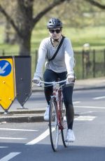 LILY JAMES Riding a Bike Out in London 04/11/2020