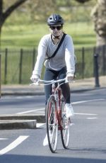 LILY JAMES Riding a Bike Out in London 04/11/2020