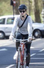 LILY JAMES Riding a Bike Out in London 04/11/2020