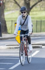 LILY JAMES Riding a Bike Out in London 04/11/2020