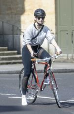 LILY JAMES Riding a Bike Out in London 04/11/2020