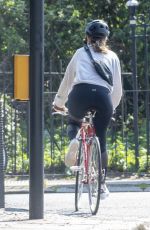 LILY JAMES Riding a Bike Out in London 04/11/2020
