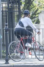 LILY JAMES Riding a Bike Out in London 04/11/2020