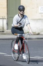 LILY JAMES Riding a Bike Out in London 04/11/2020