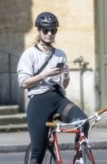 LILY JAMES Riding a Bike Out in London 04/11/2020