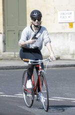 LILY JAMES Riding a Bike Out in London 04/11/2020