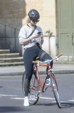 LILY JAMES Riding a Bike Out in London 04/11/2020