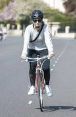 LILY JAMES Riding a Bike Out in London 04/11/2020