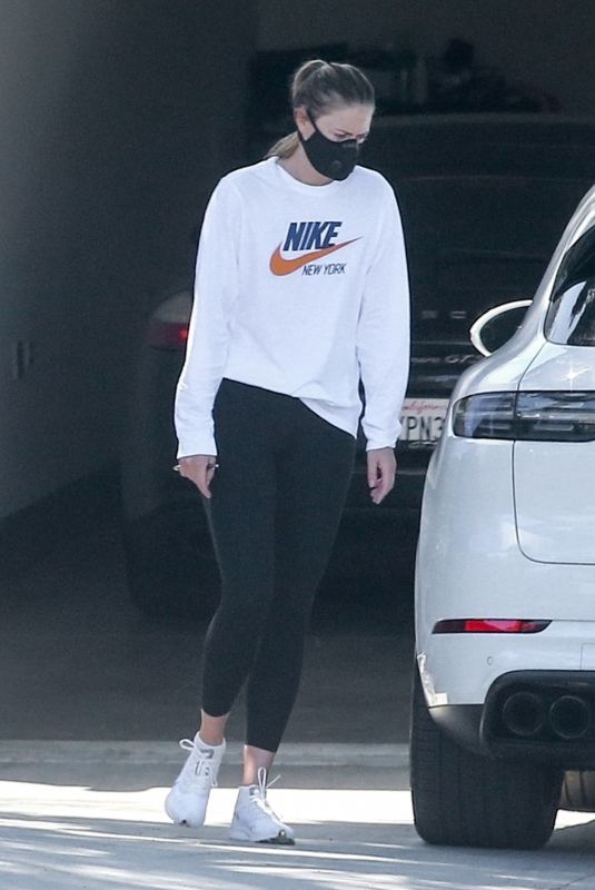 MARIA SHARAPOVA Inspects her Car After Getting It Delivered 04/21/2020