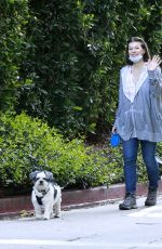 MILLA JOVOVICH Out with Her Dogs in Los Angeles 04/24/2020