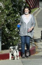 MILLA JOVOVICH Out with Her Dogs in Los Angeles 04/24/2020