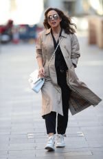 MYLEENE KLASS in a Trench Coat Arrives at Smooth Radio in London 04/04/2020
