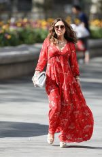 MYLEENE KLASS in Red Maxi Dress Arrives at Smooth Radio in London 04/25/2020