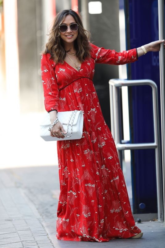 MYLEENE KLASS in Red Maxi Dress Arrives at Smooth Radio in London 04/25/2020
