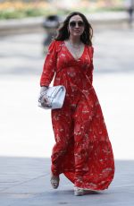 MYLEENE KLASS in Red Maxi Dress Arrives at Smooth Radio in London 04/25/2020