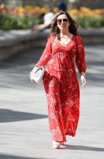 MYLEENE KLASS in Red Maxi Dress Arrives at Smooth Radio in London 04/25/2020