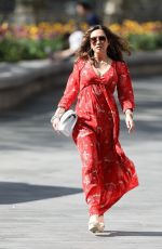 MYLEENE KLASS in Red Maxi Dress Arrives at Smooth Radio in London 04/25/2020