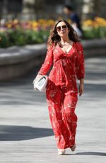 MYLEENE KLASS in Red Maxi Dress Arrives at Smooth Radio in London 04/25/2020