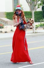 PHOEBE PRICE in a Red Dress Out with Her Dog 04/18/2020