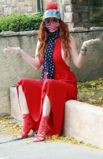 PHOEBE PRICE in a Red Dress Out with Her Dog 04/18/2020