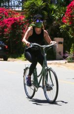 REESE WITHERSPOON Out Riding Her Bike in Malibu 04/24/2020