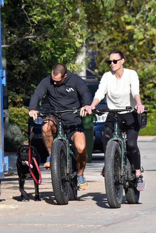 ROBIN WRIGHT and Clement Giraudet Out Riding Bikes with Their Dog in Pacific Palisades 04/21/2020